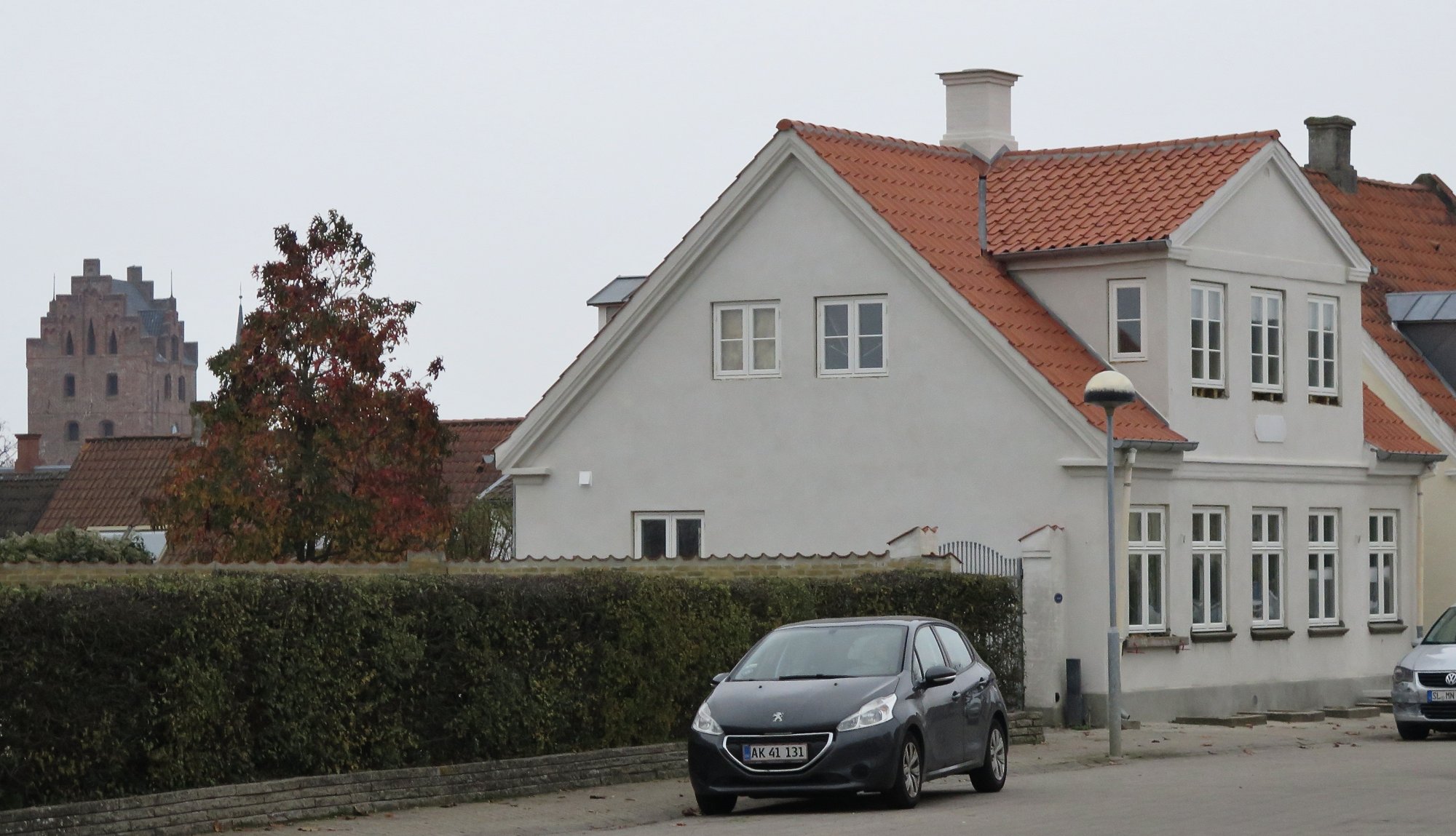Det historiske hus Buggeshave med navnet synligt på facaden